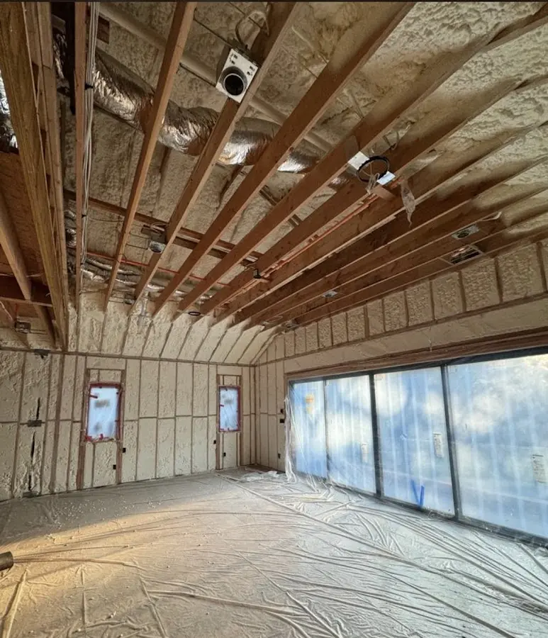 Interior walls and ceiling insulated with spray foam during new construction in Westfield